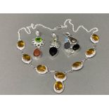 Silver jewellery comprising of a yellow stone necklace and three hardstone pendants