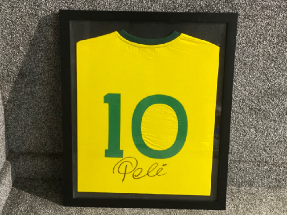 Framed 1970’s brazil number 10 football shirt, signed on the back by the football legend “Pele” with