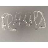 Two sets of silver necklaces and matching earring 55.5g
