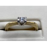 Ladies 9ct Yellow Gold cubic zirconia ring, featuring a round cubic zirconia set in a tension