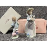 Nao by Lladro “Boy on the phone” and “what a arm full” in good condition with original boxes