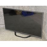 LG 47inch Digital TV on built in stand, with lead