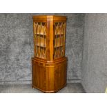 Pair of matching yew-wood corner units both with keys