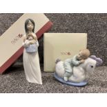 Nao by Lladro “A new doll” and “Rock me to sleep” in good condition and original boxes