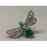 A silver marcasite bee pattern ring with green stones size N 13g