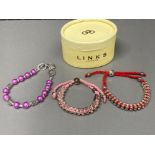 Two Links of London bracelets and another with silver clasp, with box