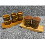 Hornsea Heirloom pattern salt & pepper shakers together with 6 egg cups, both with wooden trays