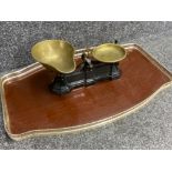 A large metal and laminate tray 67cm wide together with a set of brass & metal vintage balance