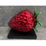 Large resin strawberry sculpture on base 48x35cm