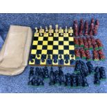 Vintage travel chess board complete with pieces & case together with a full set of oriental style