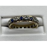 Ladies yellow gold sapphire and white stone full eternity band, size K 2.4grm