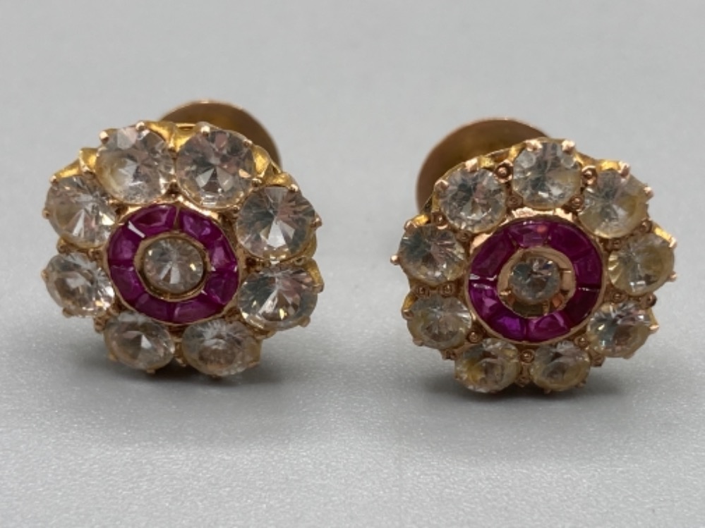 A pair of 9ct gold ruby and paste earrings with screw fittings 3.2g gross