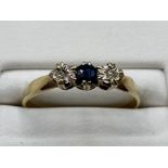 Ladies 9ct Yellow Gold sapphire and diamond 3 stone ring, comprising of 2 diamonds and 1 sapphire