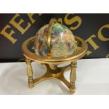 Gilt metal framed gemstone globe with built in compass base
