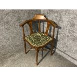 An Edwardian inlaid mahogany corner chair