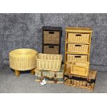 Two wicker storage boxes together with picnic baskets and footstool