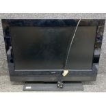 Technika 26inch TV on stand with power lead