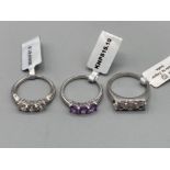 Three silver zircon and amethyst rings by Gemporia sizes R and T 11.7g gross with COAs
