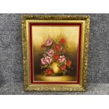 Framed Oil on canvas still life painting of flowers signed bottom right. (40cm x 50cms)