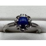 Ladies 9ct white gold blue stone ring, 2.1grm size L