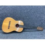 An acoustic guitar by Zenith no 2089