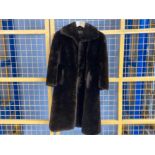 A 3/4 length beaver fur coat