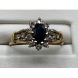 Ladies 9ct Yellow Gold sapphire and cubic zirconia cluster ring, 2.3grm size M