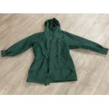 A vintage Berghaus green overcoat