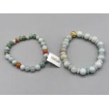 Two jadeite bracelets by Gemporia with COAs and slips