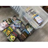 Large plastic box containing miscellaneous DVDs including a selection of box sets - Last of the