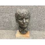 A bronzed plaster bust of a boy by Joan Fay 36cm high including plinth