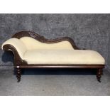 Victorian Mahogany framed metal studded chaise longue, upholstered in a cream fabric with heavy