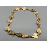 9ct gold engine turned heart bracelet. 2.9g