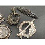A lot comprising of white metal & silver brooches -Different styles - combined weight 63.5g gross