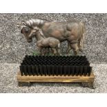 Horse doorstop with shoebrush