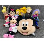 Wicker basket containing a selection of of Walt Disney soft toys