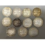 Total of 11 King George V silver 3d coins with mixed dates ranging from 1914 to 1920