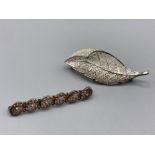 2 silver filigree brooches, 7.6grm