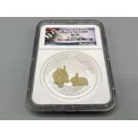 2011 gilt Australia silver $1 year of the rabbit 1oz coin. Graded and sealed by NGC