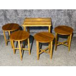 Teak nest of five tables, 1x rectangular & 4x circular drop leaf occasional tables