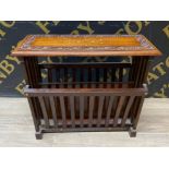 Mahogany magazine table with hand carved top with brass inlay