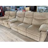 Reclining 2 piece suite upholstered in a brown fabric