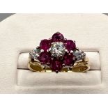 Ladies 9ct gold Ruby and cz cluster ring. 3.1g size O