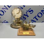 Junghans 1000 day ato glass dome clock for repair and a mounted handmade brass model of a steam