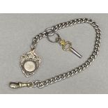 Hallmarked Birmingham silver fob on metal chain, with pocket watch key, 23.1g