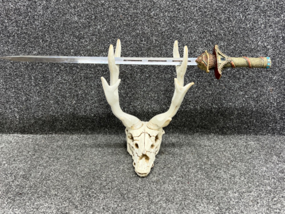 Large sword and skull holder