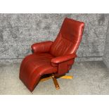 Red leather stressless style chair.