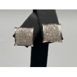 Ladies 9ct gold diamond square shaped cluster stud earrings. Comprising 110 round brilliant cut