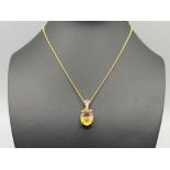 Ladies 9ct gold citrine and diamond pendant necklace. 4.4g