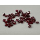 10.96cts round cut Garnets 4mm